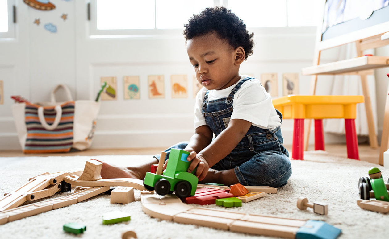 African American Child playing with toys